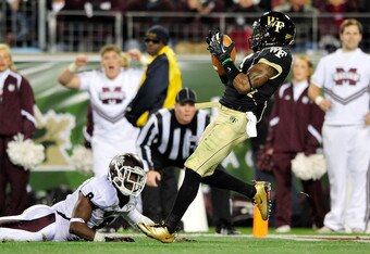 NASHVILLE, TN - DECEMBER 30:  Merrill Noel #7 of the Wake Forest Demon Deacons intercepts a pass intended for Chris Smith #8 of the Mississippi State Bulldogs during play at the Franklin American Mortgage Music City Bowl at LP Field on December 30, 2011 in Nashville, Tennessee. Mississippi State won 23-17.  (Photo by Grant Halverson/Getty Images)
