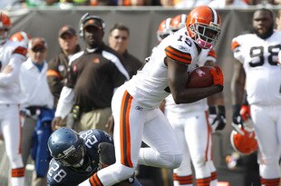 CLEVELAND, OH - OCTOBER 23:  Wide receiver Greg Little #15 of the Cleveland Browns runs from cornerback Walter Thurmond #28 of the Seattle Seahawks at Cleveland Browns Stadium on October 23, 2011 in Cleveland, Ohio.  (Photo by Matt Sullivan/Getty Images)