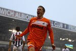 WEST BROMWICH, ENGLAND - FEBRUARY 04:  Gylfi Sigurdsson of Swansea celebrates scoring his teams first goal during the Barclays Premier League match between West Bromwich Albion and Swansea City at The Hawthorns on February 4, 2012 in West Bromwich, England.  (Photo by Julian Finney/Getty Images)