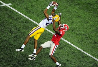 ATLANTA, GA - DECEMBER 3: Tharold Simon #24 of the LSU Tigers intercepts a pass against Tavarres King #12 of the Georgia Bulldogs during the SEC Championship Game at the Georgia Dome on December 3, 2011 in Atlanta, Georgia. Photo by Scott Cunningham/Getty Images)