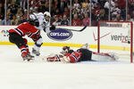 NEWARK, NJ - MAY 30:  Anze Kopitar #11 of the Los Angeles Kings shoots the game winning goal in overtime against Dainius Zubrus #8 and Martin Brodeur #30 of the New Jersey Devils during Game One of the 2012 NHL Stanley Cup Final at the Prudential Center on May 30, 2012 in Newark, New Jersey.  (Photo by Elsa/Getty Images)