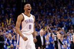 OKLAHOMA CITY, OK - MAY 31:  Russell Westbrook #0 of the Oklahoma City Thunder reacts in the fourth quarter while taking on the San Antonio Spurs in Game Five of the Western Conference Finals of the 2012 NBA Playoffs at Chesapeake Energy Arena on May 31, 2012 in Oklahoma City, Oklahoma. NOTE TO USER: User expressly acknowledges and agrees that, by downloading and or using this photograph, User is consenting to the terms and conditions of the Getty Images License Agreement.  (Photo by Brett Deering/Getty Images)