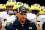 SOUTH BEND, IN - SEPTEMBER 11: Head coach Rich Rodriguez of the Michigan Wolverines waits with his team before entering the field for a game against the Notre Dame Fighting Irish at Notre Dame Stadium on September 11, 2010 in South Bend, Indiana. Michigan defeated Notre Dame 28-24. (Photo by Jonathan Daniel/Getty Images)