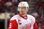GLENDALE, AZ - FEBRUARY 06:  Nicklas Lidstrom #5 of the Detroit Red Wings during the NHL game against the Phoenix Coyotes at Jobing.com Arena on February 6, 2012 in Glendale, Arizona. The Coyotes defeated the Red Wings 3-1.  (Photo by Christian Petersen/Getty Images)