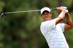 PONTE VEDRA BEACH, FL - MAY 12:  Tiger Woods of the United States hits his tee shot on the ninth hole during the third round of THE PLAYERS Championship held at THE PLAYERS Stadium course at TPC Sawgrass on May 12, 2012 in Ponte Vedra Beach, Florida.  (Photo by Sam Greenwood/Getty Images)