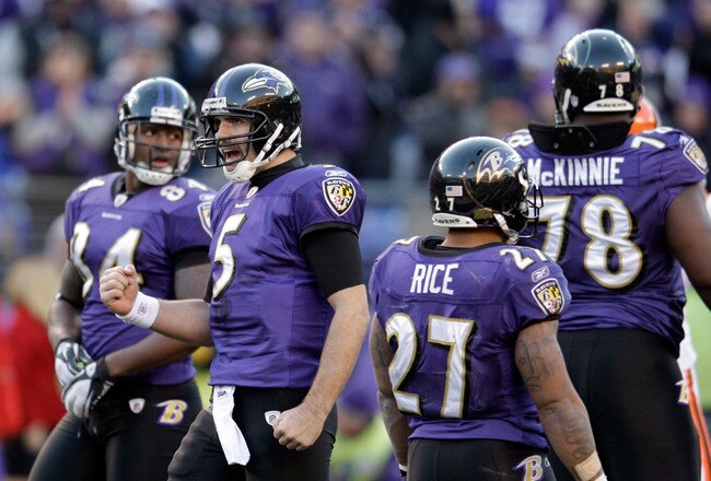BALTIMORE, MD - DECEMBER 24:  Joe Flacco #5 of the Baltimore Ravens celebrates during the closing moments of the Ravens 20-14 win over the Cleveland Browns at M&T Bank Stadium on December 24, 2011 in Baltimore, Maryland.  (Photo by Rob Carr/Getty Images)