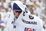 CHICAGO, IL - MAY 28: Matt Garza #22 of the Chicago Cubs tries to stay cool on a 90 degree day during a game against the San Diego Padres on May 28, 2012 at Wrigley Field in Chicago, Illinois.  (Photo by David Banks/Getty Images)