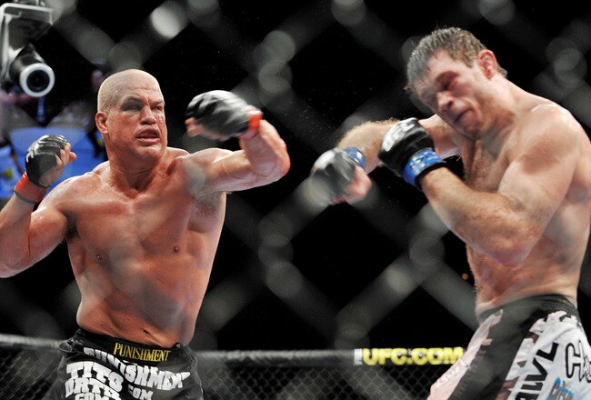 LAS VEGAS - NOVEMBER 21: Tito Ortiz (L) battles Forrest Griffin (R) during their Light Heavyweight Fight at the UFC 106 at Mandalay Bay Events Center on November 21, 2009 in Las Vegas, Nevada. (Photo by Jon Kopaloff/Getty Images)