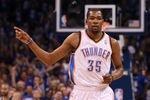 OKLAHOMA CITY, OK - MAY 31:  Kevin Durant #35 of the Oklahoma City Thunder reacts in the first quarter while taking on the San Antonio Spurs in Game Five of the Western Conference Finals of the 2012 NBA Playoffs at Chesapeake Energy Arena on May 31, 2012 in Oklahoma City, Oklahoma. NOTE TO USER: User expressly acknowledges and agrees that, by downloading and or using this photograph, User is consenting to the terms and conditions of the Getty Images License Agreement.  (Photo by Ronald Martinez/Getty Images)