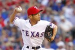 ARLINGTON, TX - MAY 30: Yoshinori Tateyama #22 of the Texas Rangers delivers a pitch against the Seattle Mariners at Rangers Ballpark in Arlington on May 30, 2012 in Arlington, Texas. (Photo by Rick Yeatts/Getty Images)