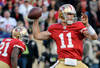 SAN FRANCISCO, CA - JANUARY 14:  Alex Smith #11 of the San Francisco 49ers looks to pass from the pocket during the NFC Divisional playoff game against the New Orleans Saints at Candlestick Park on January 14, 2012 in San Francisco, California.  (Photo by Thearon W. Henderson/Getty Images)