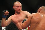 SYDNEY, AUSTRALIA - MARCH 03:  Martin Kampmann of Denmark and Thiago Alves of Brazil fight during the UFC On FX welterweight bout between Martin Kampmann and Thiago Alves at Allphones Arena on March 3, 2012 in Sydney, Australia.  (Photo by Mark Kolbe/Getty Images)
