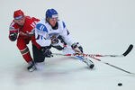 ZURICH, SWITZERLAND - MAY 02:  Leo Komarov of Finland (R) tangles with Dmitri Meleshko of Belarus during the IIHF World Championship match between Finland v Belarus at the Arena Zurich-Kloten on May 2, 2009 in Zurich, Switzerland.  (Photo by Mike Hewitt/Getty Images)