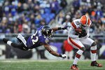 BALTIMORE - DECEMBER 24:  Carlton Mitchell #18 of the Cleveland Browns makes this catch while Jimmy Smith #22 of the Baltimore Ravens defends at M&T Bank Stadium on December 24, 2011 in Baltimore, Maryland. The Ravens defeated the Browns 20-14. (Photo by Larry French/Getty Images)