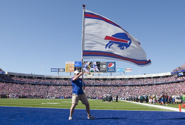 ORCHARD PARK, NY - OCTOBER 09:   Fans celebrate and the end zone flag is waived after a touchdown scored by Freddie Jackson #22 of the Buffalo Bills against the Philadelphia Eagles at Ralph Wilson Stadium on October 9, 2011 in Orchard Park, New York.  (Photo by Brody Wheeler/Getty Images)
