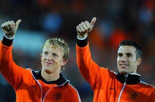 ROTTERDAM, NETHERLANDS - OCTOBER 07: Robin van Persie (R) and Dirk Kuyt of the Netherlands greet fans prior to the start of the UEFA EURO 2012 Group E Qualifier between Netherlands and Moldova at the Kuip stadium on October 7, 2011 in Rotterdam, Netherlands.  (Photo by Jasper Juinen/Getty Images)
