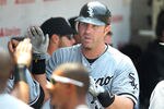 CHICAGO, IL - MAY 20: Adam Dunn #32 of Chicago White Sox celebrates after hitting a solo home run in the top of the fourth inning against the Chicago Cubs during Interleague the game at Wrigley Field on May 20, 2012 in Chicago, Illinois. (Photo by Mike McGinnis/Getty Images)