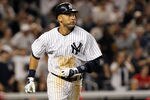 NEW YORK, NY - APRIL 15:  Derek Jeter of the New York Yankees rounds the bases after hitting a three run home run in the fourth inning against the Los Angeles Angels of Anaheim at Yankee Stadium on April 15, 2012 in the Bronx borough of New York City. In honor of Jackie Robinson Day, all players across Major League Baseball will wear number 42.  (Photo by Nick Laham/Getty Images)