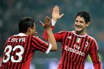 MILAN, ITALY - NOVEMBER 27:  Pato (R) and Thiago Silva of AC Milan celebrates scoring the first goal during the Serie A match between AC Milan v AC Chievo Verona at Stadio Giuseppe Meazza on November 27, 2011 in Milan, Italy.  (Photo by Claudio Villa/Getty Images)