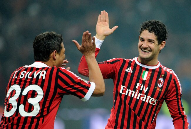 MILAN, ITALY - NOVEMBER 27:  Pato (R) and Thiago Silva of AC Milan celebrates scoring the first goal during the Serie A match between AC Milan v AC Chievo Verona at Stadio Giuseppe Meazza on November 27, 2011 in Milan, Italy.  (Photo by Claudio Villa/Getty Images)