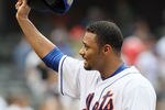 NEW YORK, NY - MAY 26:  Johan Santana #57 of the New York Mets tips his cap after his complete game shutout against the San Diego Padres at Citi Field on May 26, 2012 in the Flushing neighborhood of the Queens borough of New York City.  (Photo by Jim McIsaac/Getty Images)