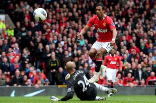 MANCHESTER, ENGLAND - APRIL 22:  Nani of Manchester United scores his team's third goal during the Barclays Premier League match between Manchester United and Everton at Old Trafford on April 22, 2012 in Manchester, England.  (Photo by Alex Livesey/Getty Images)