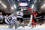 NEWARK, NJ - MAY 30:  Jonathan Quick #32 of the Los Angeles Kings makes a save against Zach Parise #9 of the New Jersey Devils during Game One of the 2012 NHL Stanley Cup Final at the Prudential Center on May 30, 2012 in Newark, New Jersey.  (Photo by Bruce Bennett/Getty Images)