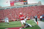LINCOLN, NE - OCTOBER 29: Running back Rex Burkhead #22 of the Nebraska Cornhuskers scores a second half touchdown against the Michigan State Spartans defense during their game at Memorial Stadium October 29, 2011 in Lincoln, Nebraska.  Nebraska defeated Michigan State 24-3. (Photo by Eric Francis/Getty Images)