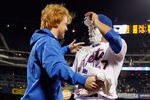 NEW YORK, NY - JUNE 01:  Johan Santana #57 of the New York Mets gets a shaving cream pie in the face from Justin Turner #2 after pitching a no hitter against the St. Louis Cardinals at CitiField on June 1, 2012 in the Flushing neighborhood of the Queens borough of New York City. Johan Santana pitched the first no hitter in Mets history as the Mets defeated the Cardinals 8-0.  (Photo by Mike Stobe/Getty Images)