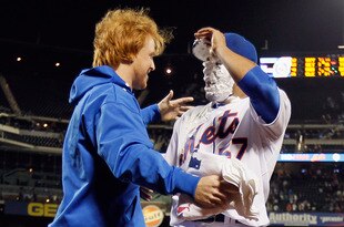 NEW YORK, NY - JUNE 01:  Johan Santana #57 of the New York Mets gets a shaving cream pie in the face from Justin Turner #2 after pitching a no hitter against the St. Louis Cardinals at CitiField on June 1, 2012 in the Flushing neighborhood of the Queens borough of New York City. Johan Santana pitched the first no hitter in Mets history as the Mets defeated the Cardinals 8-0.  (Photo by Mike Stobe/Getty Images)
