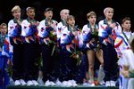 23 Jul 1996: Kerri Strug of the USA stands with a hurt ankle for the National Anthem during the awards ceremony at the Georgia Dome in the 1996 Olympic Games in Atlanta, Georgia. Mandatory Credit: Mike Powell  /Allsport