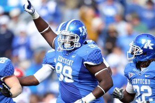 LEXINGTON, KY - OCTOBER 22: Donte Rumph #99 of the Kentucky Wildcats celebrates during the game against the Jacksonville State Gamecocks at Commonwealth Stadium on October 22, 2011 in Lexington, Kentucky.  (Photo by Andy Lyons/Getty Images)