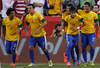 LANDOVER, MD - MAY 30: Neymar #11 of Brazil is congratulated by teammates after scoring a goal against USA during an International friendly game at FedExField on May 30, 2012 in Landover, Maryland.  (Photo by Rob Carr/Getty Images)