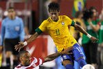 LANDOVER, MD - MAY 30:  Neymar #11 of Brazil and Jermaine Jones #13 of USA collide going after the ball during an International friendly game at FedExField on May 30, 2012 in Landover, Maryland.  (Photo by Rob Carr/Getty Images)