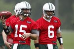 FLORHAM PARK, NJ - MAY 24:  Tim Tebow #15 and Mark Sanchez #6 of the New York Jets work out at an organized team activity at the New York Jets Atlantic Health Jets Training Center on May 24, 2012 in Florham Park, New Jersey.  (Photo by Jeff Zelevansky/Getty Images)