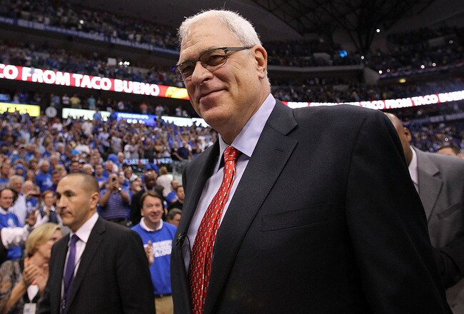 DALLAS, TX - MAY 08:  Head coach Phil Jackson of the Los Angeles Lakers leaves court after a loss against the Dallas Mavericks in Game Four of the Western Conference Semifinals during the 2011 NBA Playoffs on May 8, 2011 at American Airlines Center in Dallas, Texas.  The Mavericks won 4-0 games against the Lakers and advanced to the Western Conference Finals. NOTE TO USER: User expressly acknowledges and agrees that, by downloading and or using this photograph, User is consenting to the terms and conditions of the Getty Images License Agreement.  (Photo by Ronald Martinez/Getty Images)