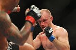 SYDNEY, AUSTRALIA - MARCH 03:  Martin Kampmann of Denmark and Thiago Alves of Brazil fight during the UFC On FX welterweight bout between Martin Kampmann and Thiago Alves at Allphones Arena on March 3, 2012 in Sydney, Australia.  (Photo by Mark Kolbe/Getty Images)