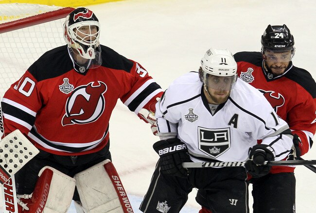 NEWARK, NJ - MAY 30:  Anze Kopitar #11 of the Los Angeles Kings in actions against Martin Brodeur #30 and Bryce Salvador #24 of the New Jersey Devils during Game One of the 2012 NHL Stanley Cup Final at the Prudential Center on May 30, 2012 in Newark, New Jersey.  (Photo by Jim McIsaac/Getty Images)