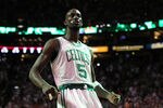 BOSTON, MA - JUNE 01:  Kevin Garnett #5 of the Boston Celtics reacts in the first half against the Miami Heat in Game Three of the Eastern Conference Finals in the 2012 NBA Playoffs on June 1, 2012 at TD Garden in Boston, Massachusetts.  NOTE TO USER: User expressly acknowledges and agrees that, by downloading and or using this photograph, User is consenting to the terms and conditions of the Getty Images License Agreement.  (Photo by Jim Rogash/Getty Images)