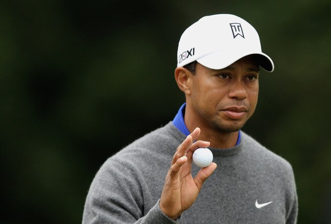 DUBLIN, OH - JUNE 01:  Tiger Woods waves to the gallery after a birdie putt on the first green during the second round of the Memorial Tournament presented by Nationwide Insurance at Muirfield Village Golf Club on June1, 2012 in Dublin, Ohio.  (Photo by Scott Halleran/Getty Images)