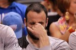 OKLAHOMA CITY, OK - MAY 31:  Manu Ginobili #20 of the San Antonio Spurs covers his face in the fourth quarter on the bench while taking on the Oklahoma City Thunder in Game Five of the Western Conference Finals of the 2012 NBA Playoffs at Chesapeake Energy Arena on May 31, 2012 in Oklahoma City, Oklahoma. NOTE TO USER: User expressly acknowledges and agrees that, by downloading and or using this photograph, User is consenting to the terms and conditions of the Getty Images License Agreement.  (Photo by Ronald Martinez/Getty Images)