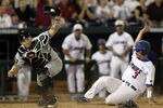 OMAHA, NE - JUNE 27:  Catcher Robert Beary #4 of the South Carolina Gamecocks makes the out against Mike Zunino #3 of the Florida Gators in the 9th inning during game 1 of the men's 2011 NCAA College Baseball World Series at TD Ameritrade Park Omaha on June 27, 2011 in Omaha, Nebraska.  (Photo by Ronald Martinez/Getty Images)