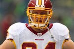 SEATTLE, WA - NOVEMBER 27:  Adam Carriker #94 of the Washington Redskins looks on prior to the game against the Seattle Seahawks at CenturyLink Field on November 27, 2011 in Seattle, Washington. (Photo by Otto Greule Jr/Getty Images)