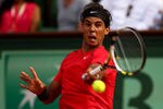 PARIS, FRANCE - JUNE 02:  Rafael Nadal of Spain plays a forehand during his men's singles third round match against Eduardo Schwank of Argentina during day seven of the French Open at Roland Garros on June 2, 2012 in Paris, France.  (Photo by Clive Brunskill/Getty Images)