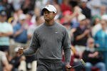 DUBLIN, OH - JUNE 02:  Tiger Woods celebrates a birdie putt on the first hole during the third round of the Memorial Tournament presented by Nationwide Insurance at Muirfield Village Golf Club on June2, 2012 in Dublin, Ohio.  (Photo by Scott Halleran/Getty Images)