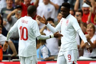LONDON, ENGLAND - JUNE 02:  Danny Welbeck of England celebrates with Ashley Young after scoring the first goal of the match during the international friendly match between England and Belgium at Wembley Stadium on June 2, 2012 in London, England.  (Photo by Clive Mason/Getty Images)