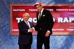 NEWARK, NJ - JUNE 23:  Jonas Valanciunas (R) from Utena, Lithuania greets NBA Commissioner David Stern after he was picked #5 overall by the Toronto Raptors in the first round during the 2011 NBA Draft at the Prudential Center on June 23, 2011 in Newark, New Jersey.  NOTE TO USER: User expressly acknowledges and agrees that, by downloading and/or using this Photograph, user is consenting to the terms and conditions of the Getty Images License Agreement.  (Photo by Mike Stobe/Getty Images)