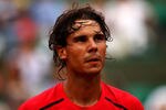 PARIS, FRANCE - JUNE 02:  Rafael Nadal of Spain looks on after winning his men's singles third round match against Eduardo Schwank of Argentina during day seven of the French Open at Roland Garros on June 2, 2012 in Paris, France.  (Photo by Clive Brunskill/Getty Images)