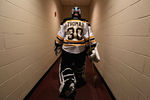 GLENDALE, AZ - DECEMBER 28:  Goaltender Tim Thomas #30 of the Boston Bruins walks back to the locker room before the NHL game against the Phoenix Coyotes at Jobing.com Arena on December 28, 2011 in Glendale, Arizona.  (Photo by Christian Petersen/Getty Images)