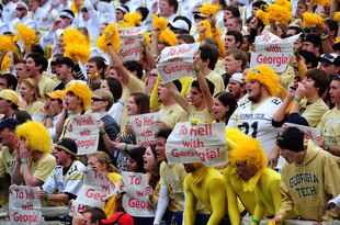 ATLANTA, GA - NOVEMBER 26: Fans of the Georgia Tech Yellow Jackets hold signs of support during the game against the Georgia Bulldogs at Bobby Dodd Stadium on November 26, 2011 in Atlanta, Georgia. (Photo by Scott Cunningham/Getty Images)